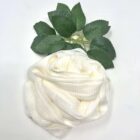 A Rose Loofah - White towel with a green leaf on it, perfect for those who appreciate a touch of nature.