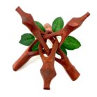 A charming, 8" Wooden Tripod Stand | Home Decor featuring a delicate leaf motif in the middle, perfect for adding a touch of nature-inspired elegance to your home decor.