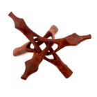 A striking home decor sculpture of a cross crafted from exquisite red wood, elegantly displayed on an 8" Wooden Tripod Stand | Home Decor.