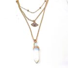 A White Clear Quartz Natural Stone Necklace with an opal stone and an evil eye.