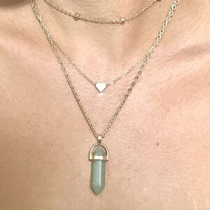 A woman wearing a Jade Natural Stone with Heart Charm Necklace | Choker | Gift | Gift for Women | Gift for Her | Dainty Necklace | Necklace for Women pendant.