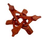 A wooden star shaped object on a white background with a 4" Wooden Tripod Stand.