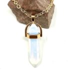 A white Clear Quartz natural stone necklace, featuring a dainty design with healing properties.