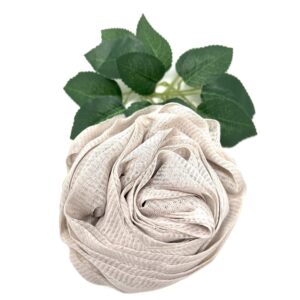 A white Rose Loofah- Light Purple- Bath- Body- Self Care with a green leaf on it, perfect for adding a touch of nature-inspired relaxation to your self-care routine.