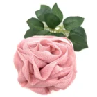 A Rose Loofah - Pink on a white background.