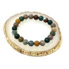 An Ocean Agate Gemstone Bracelet 8mm featuring a vibrant array of colors, crafted with Ocean Agate and adorned with gold plating.