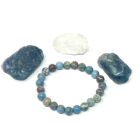 A Blue Sea Sediment Jasper Gemstone Bracelet adorned with stunning blue sea sediment jasper stones and crystals.