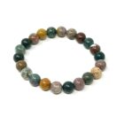 An Ocean Agate gemstone bracelet with green, brown, and yellow stones.