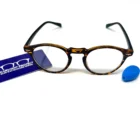 A pair of Blue Light Blocking Photochromic Glasses Round Circle Lenses - Grey/ Red/Blue with blue light blocking lenses.