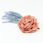 A peach rose with lavender flowers on a Rose Loofah- Dark Pink & White background.