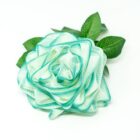 A blue and green Rose Loofah- Green&White- Bath- Body- Self Care on a white background.