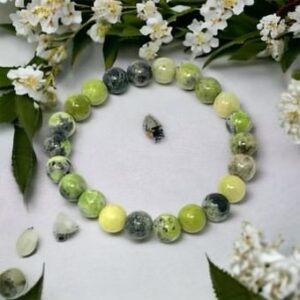 An Australian Chrysophrase Bracelet adorned with Chrysophrase beads and flowers.